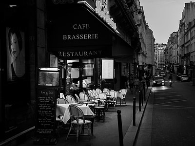 grayscale photography of Cafe Brasserie restaurant