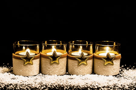 four glass candle holders photo