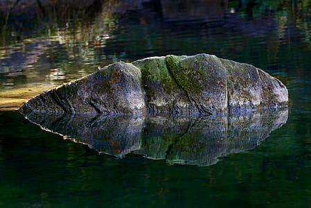 stone between body of water
