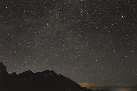 photo of stars and mountain