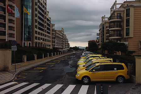 Parked Yellow Taxi Cab Waiting for a Fare