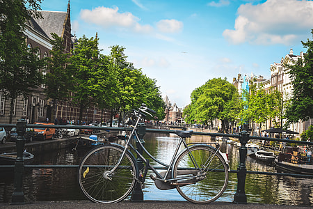 Bicycle by a canal in Amsterdam, Holland