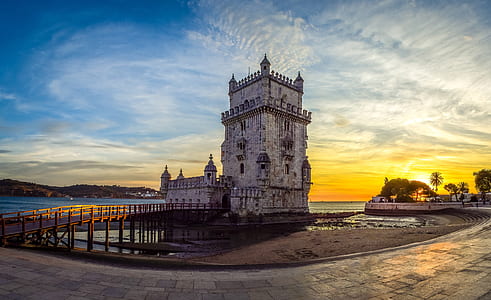 Royalty-Free photo: Architectural photography of beige stone tower near ...