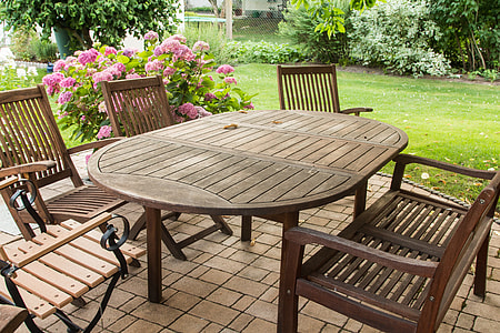 outdoor oval wooden table and chairs