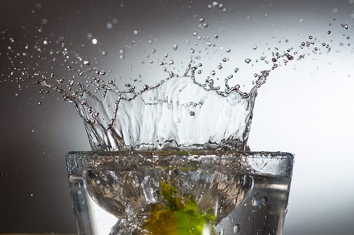 splash of water on drinking glass