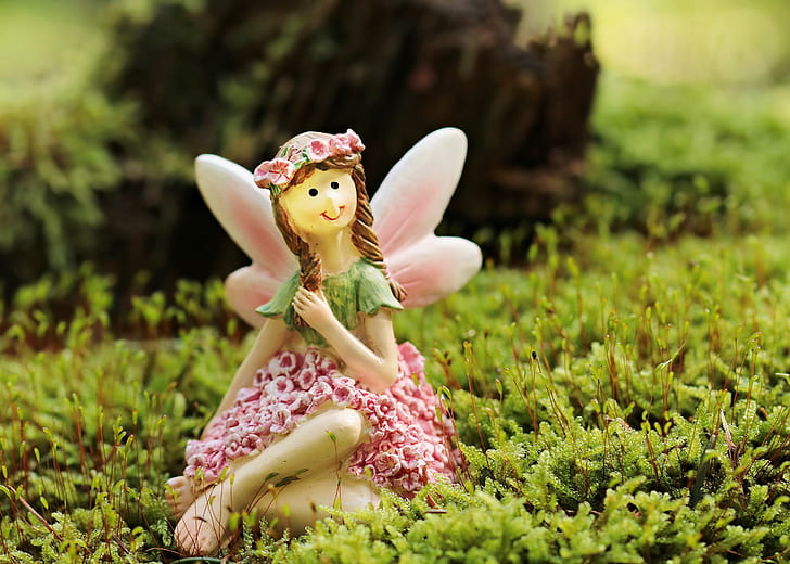 girl fairy ceramic figurine on land
