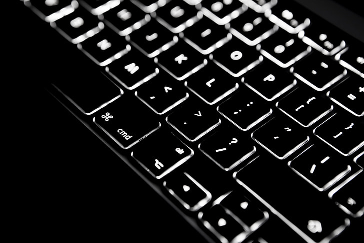 Close-up shot of backlit keyboard on an Apple Macbook Pro retina laptop model