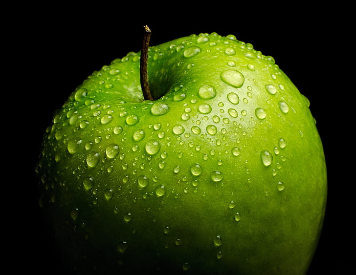 green apple with dew drop