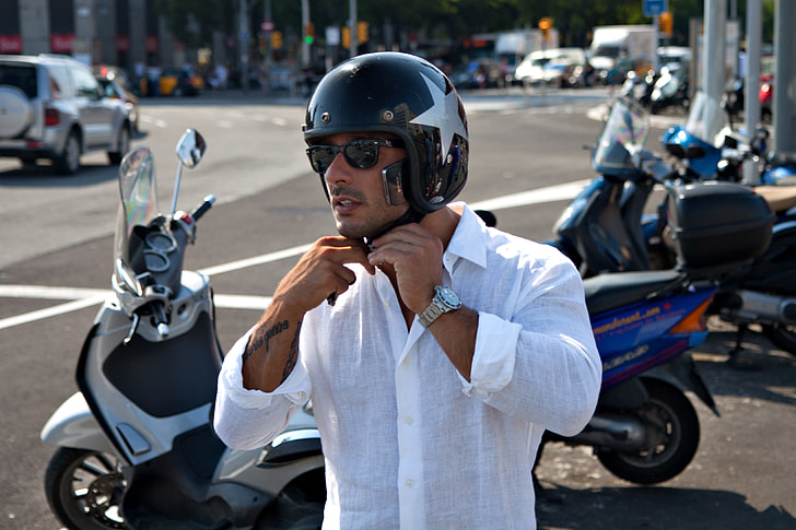 Street shot of a biker in the centre of Barcelona, Spain. Image captured with a Canon DSLR