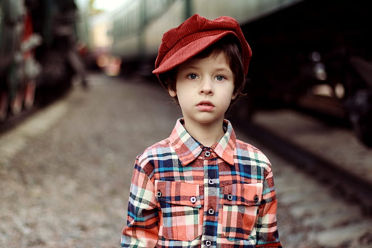 boy wearing red hat