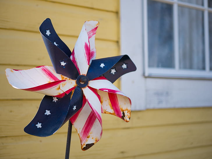small blue, white, and pink stars print windmill toy