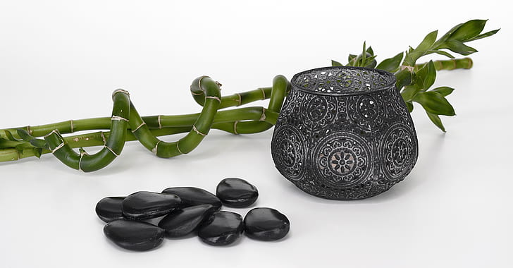 black stones and black vase