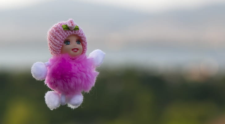 pink and white doll