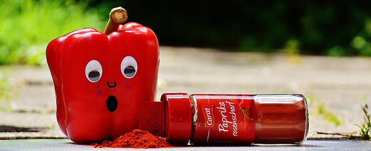 Red Pepper Beside Red Paprika Plastic Bottle
