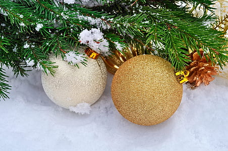 white and brass Christmas ball decors