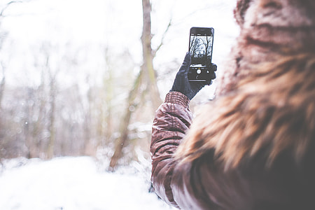 Girl Shooting with her iPhone 6 in Winter