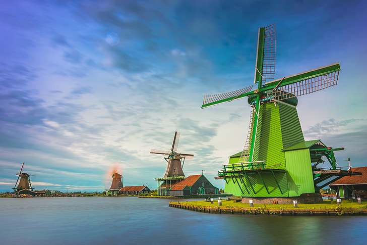 Windmills on a river in Holland