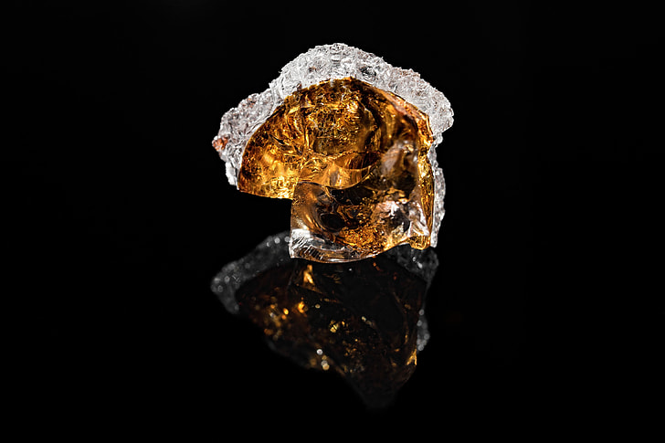 amber stone with black background