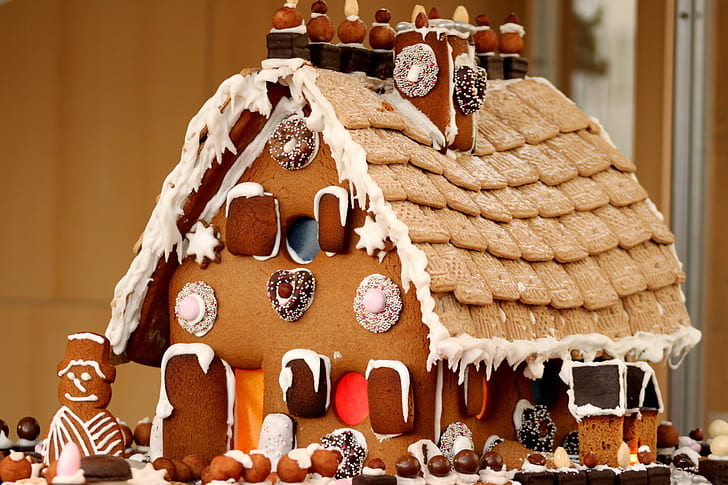 brown and white ginger bread house model