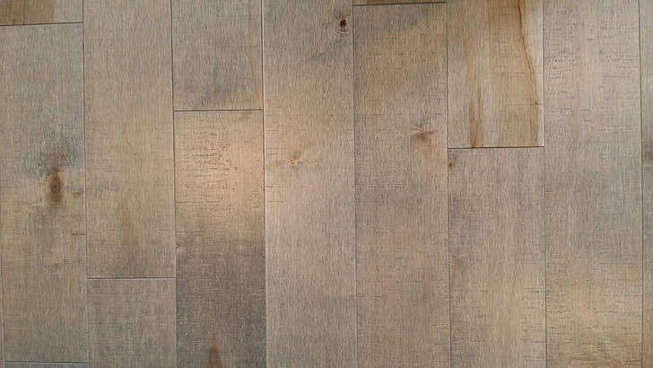 close photo of rectangular brown parquet floor