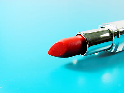 shallow focus photography of red lipstick