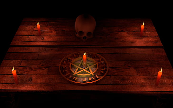five red candles, brown pentagram, and human skull