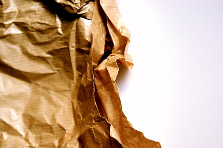 brown paper wrapper on top of white surface