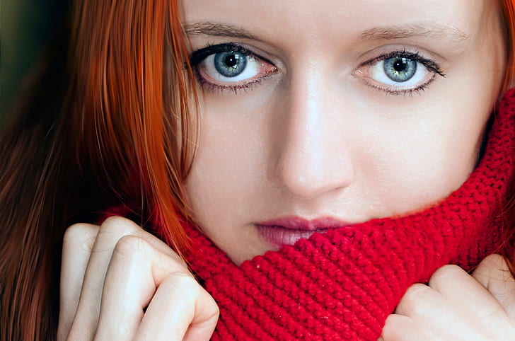 woman with red hair wearing red knitted scarf
