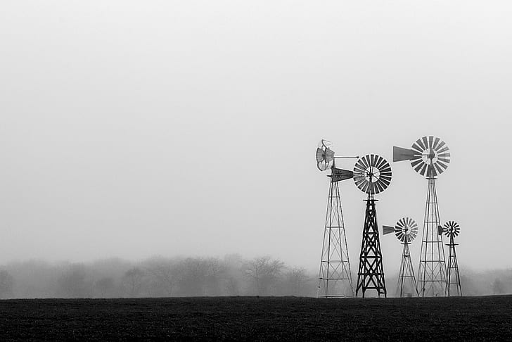 silhouette of five windmills