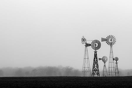 silhouette of five windmills