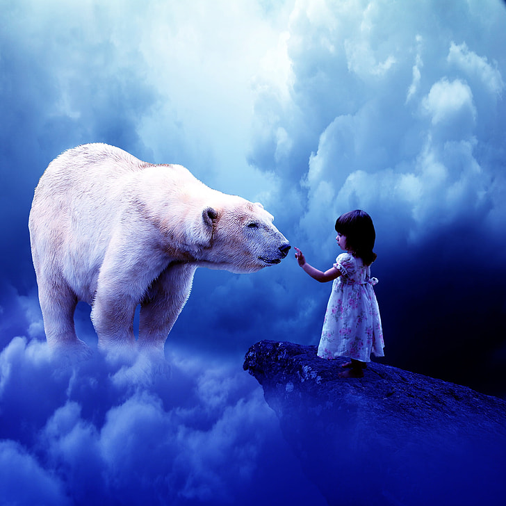 girl on cliff with Polar Bear