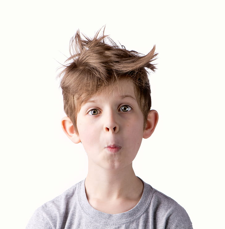 boy wearing gray crew-neck shirt with white background