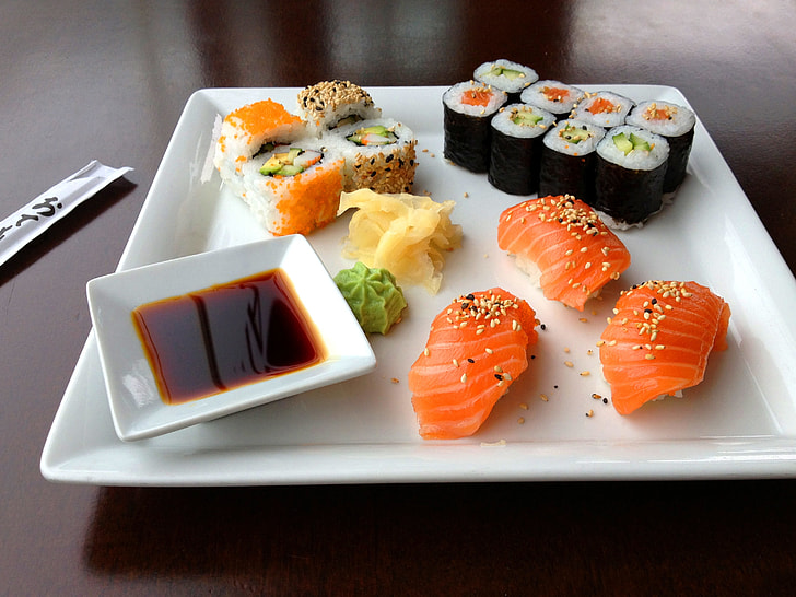 sushi on square white ceramic plate