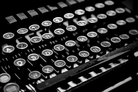 grayscale photo of typewriter
