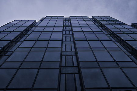 Wide angle architectural shot of a glass building front in London, England. Image captured with a Canon 5D