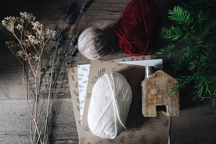 yarn and leaves flat lay photography