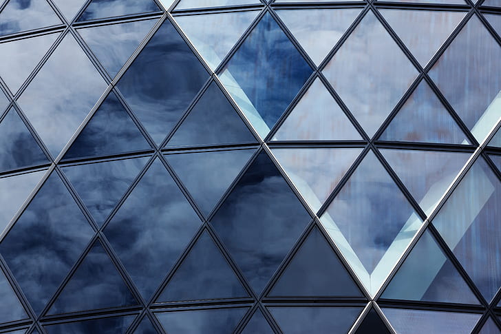 close-up photo of black metal framed glass building