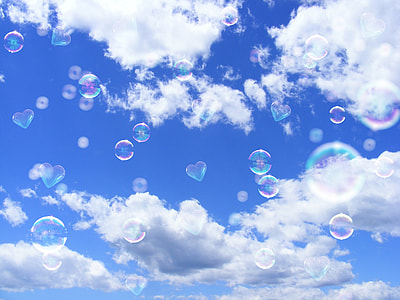 heart and round bubbles on air during daytime