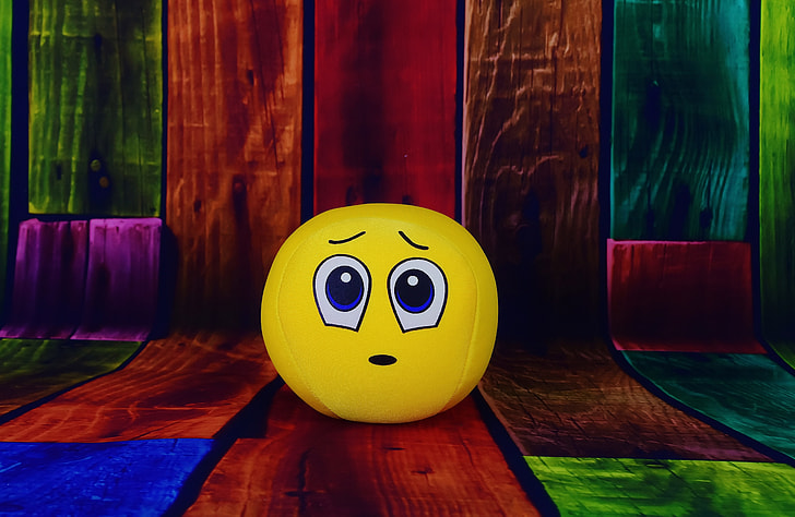 photography of scared emoji ball