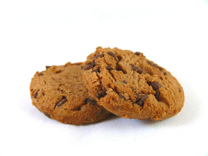 close up photo of two chocolate cookies