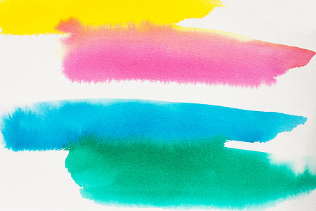 pink, yellow, teal, and green paint swatches