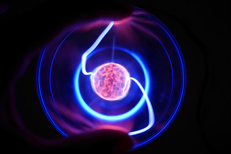 Touch of Life: Fingers on Plasma Ball Lamp