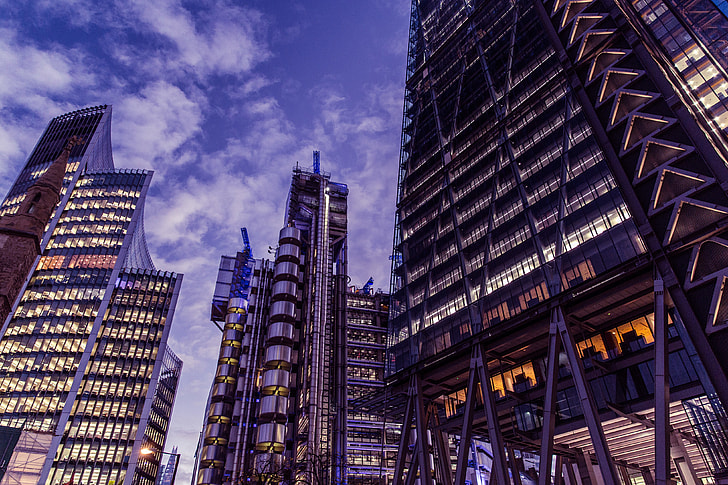 Wide-angle shot taken at dusk in the financial district of London