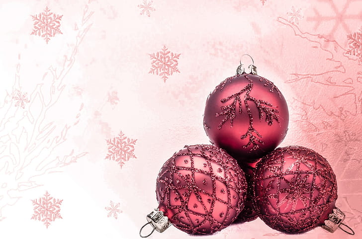 photo of four pink baubles