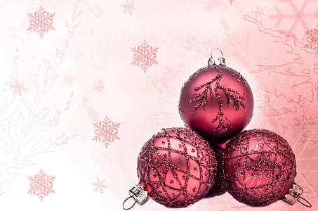 photo of four pink baubles
