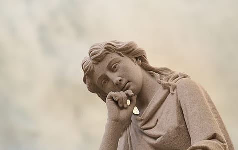 female concrete statue