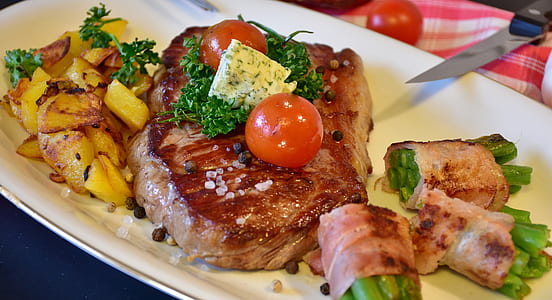 grilled meat on white ceramic tray