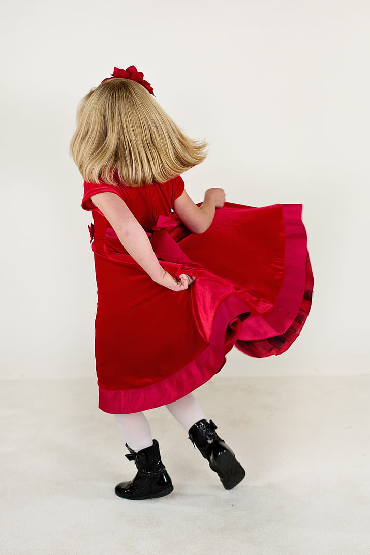 girl wearing red velvet short-sleeved dress