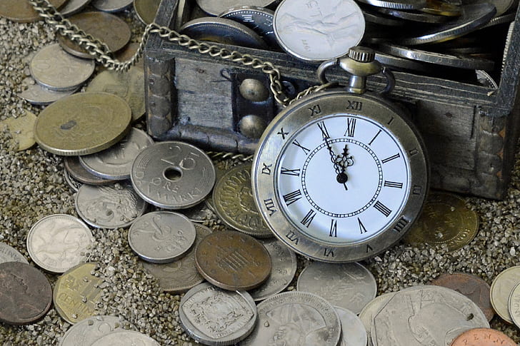 round silver-colored case pocket watch