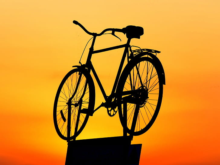 silhouette photography of bicycle during sunset